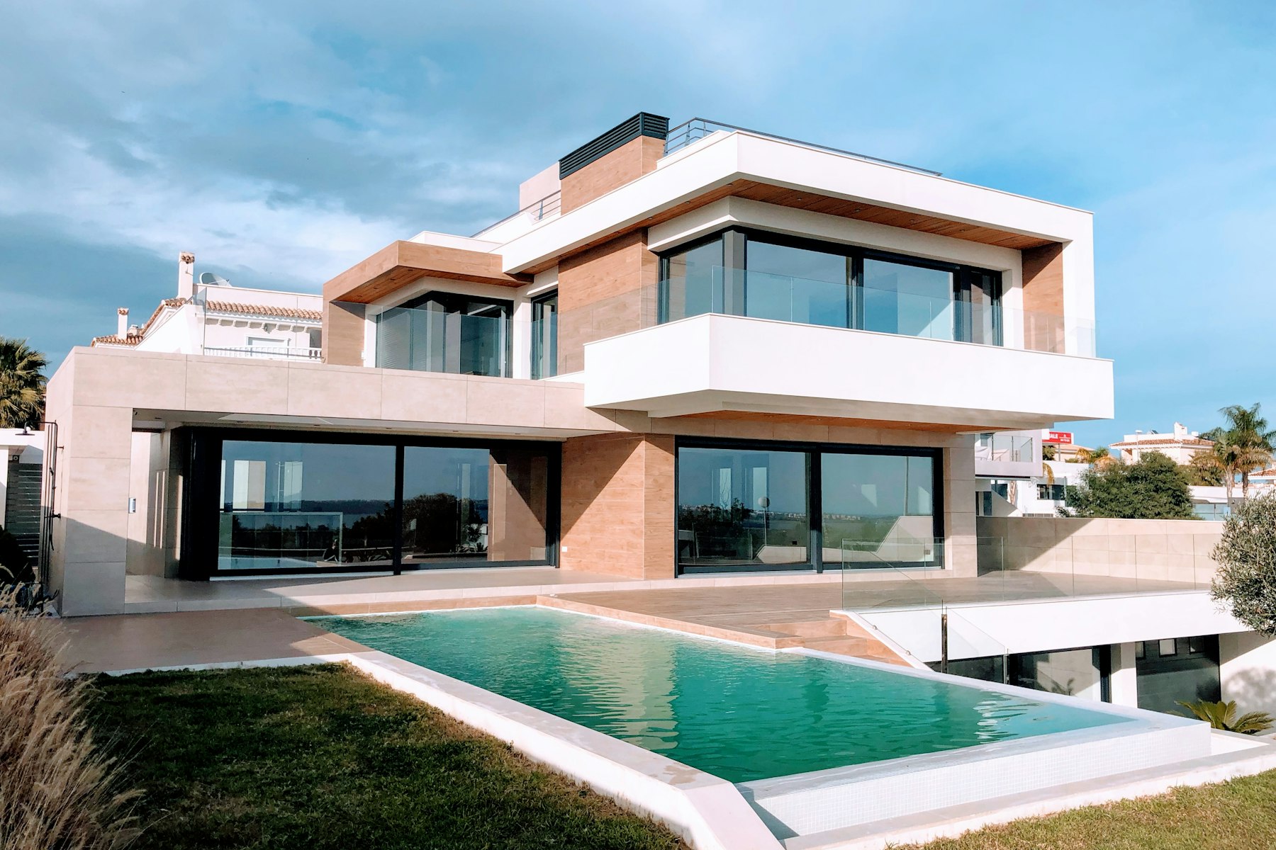 The home and pool at dusk.